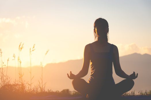 silhouette-fitness-girl-practicing-yoga-mountain-with-sun-light-scaled-1.jpg
